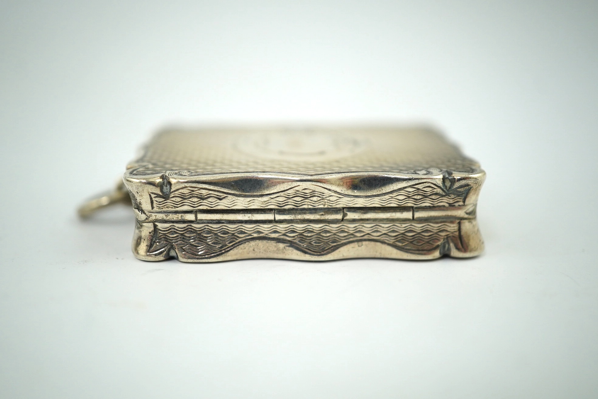 Two Victorian silver vinaigrettes, rectangular, mm. CC, Birmingham 1871, 4.2cm and lozenge shaped, by George Unite, Birmingham 1848, 4cm. Condition - fair to good